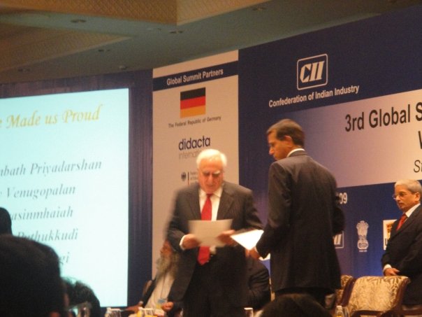 Kapil Sibal on Skill To improve gross enrolement ratio: The HRD Minister, Mr. Kapil Sibal, with Mr. B. Santhanam, MD, Saint-Gobain Glass India, at the third CII global summit on skills development, in the Capital